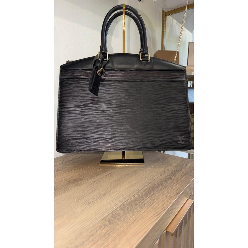 Authentic Louis Vuitton Epi Riviera black leather w name tag COA included